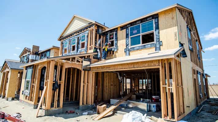 New home construction framing on a prepared site